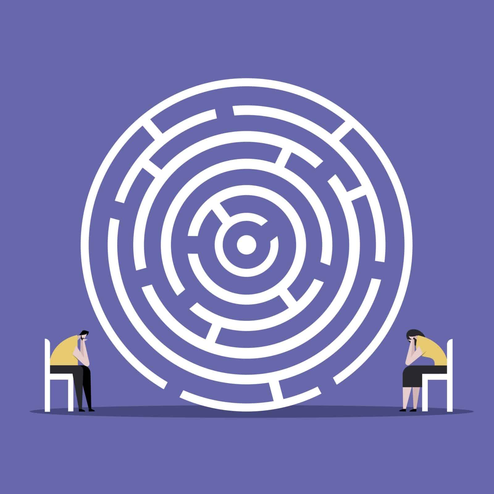 A divorcing couple sits between a maze, illustrating how difficult it is to manage divorce without a mediator. 